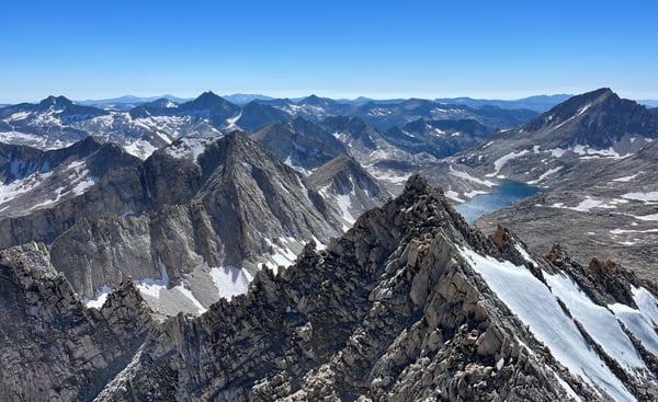 View from the summit with Lake Italy shining below